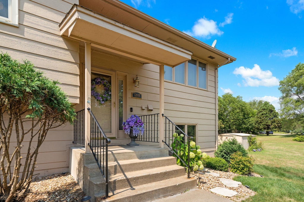Photo of 12088 Oregon Circle N, Champlin, MN 55316 (MLS # 7112801)