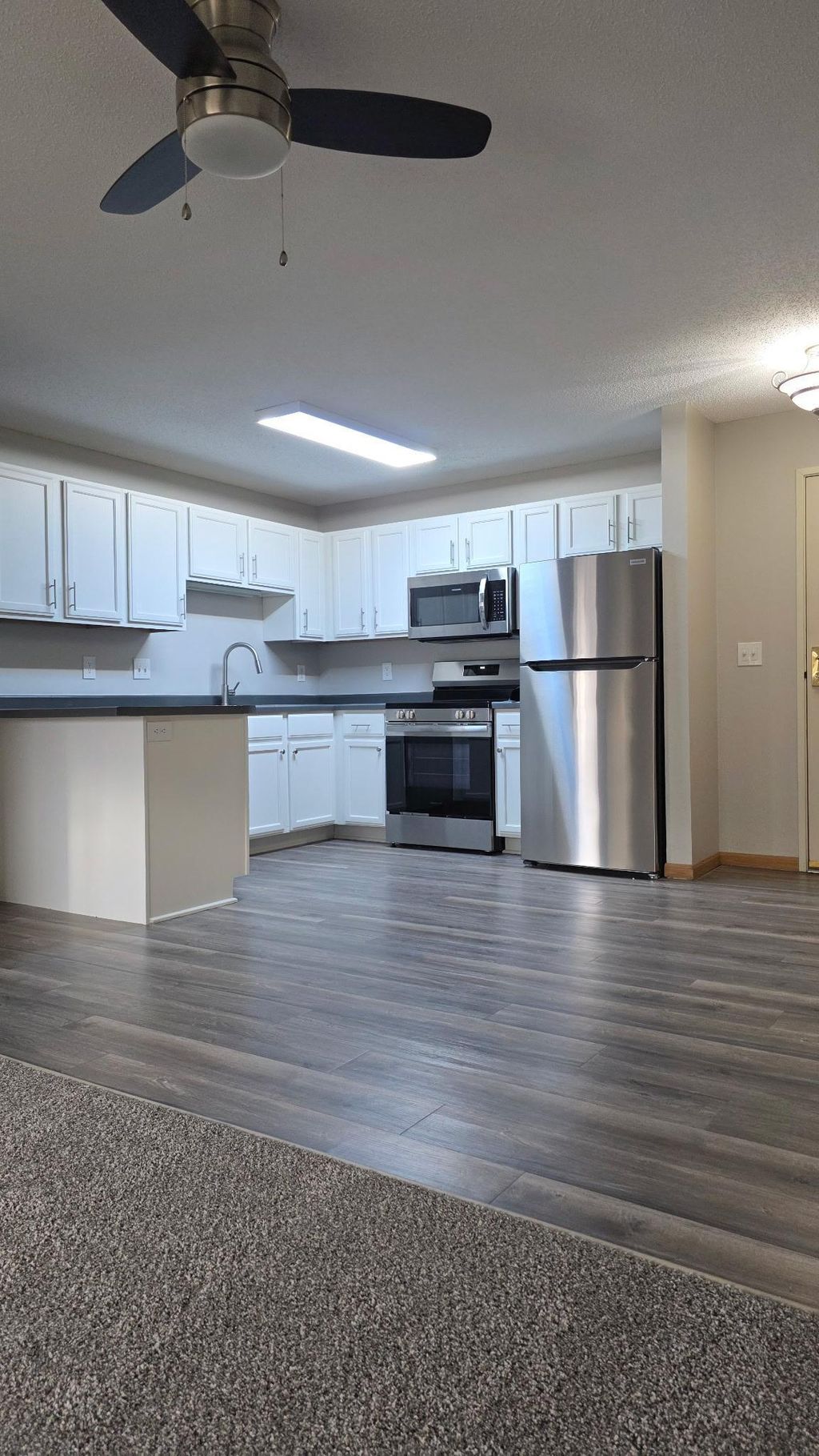 Photo of 1321 Lake Drive W #101, Chanhassen, MN 55317 (MLS # 7044744)