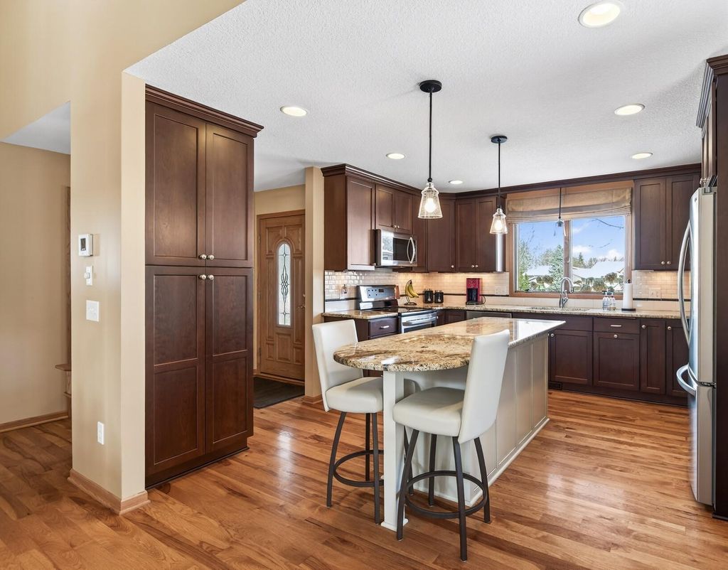 Photo of 3501 W 99th Street, Bloomington, MN 55431 (MLS # 7039161)