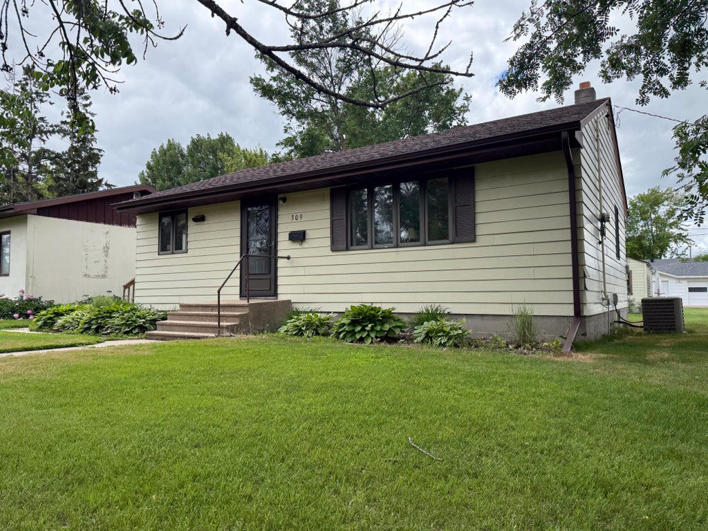 Photo of 309 7th Avenue NE, Roseau, MN 56751 (MLS # 7097257)