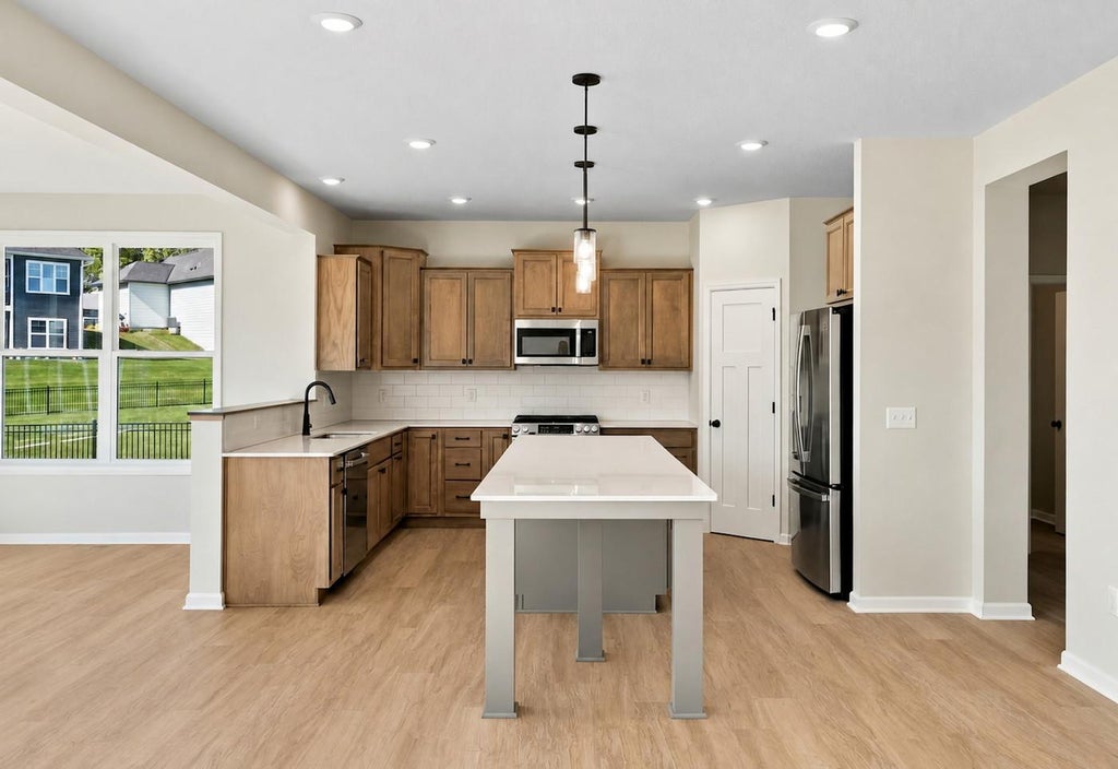 Photo of 1185 Oakwood Lane S, Delano, MN 55328 (MLS # 7158450)