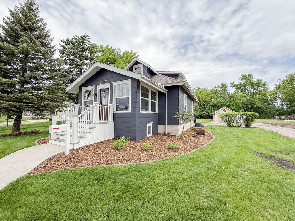 Photo of 1316 W Fairview Avenue, Olivia, MN 56277 (MLS # 7084813)