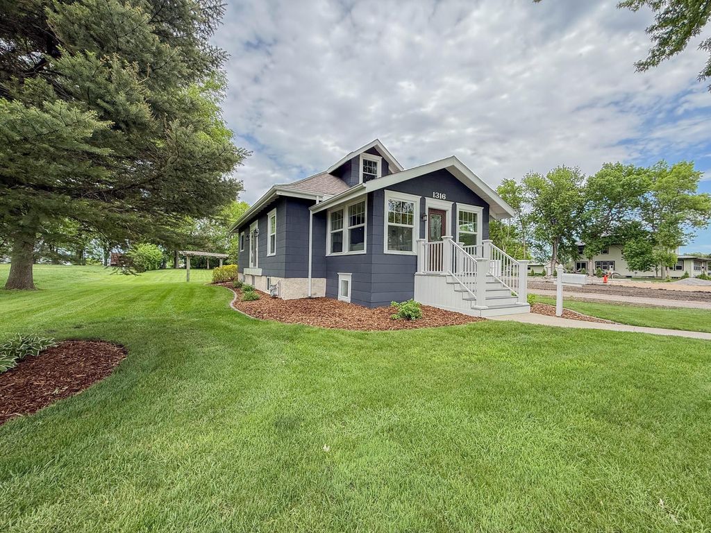 Photo of 1316 W Fairview Avenue, Olivia, MN 56277 (MLS # 7084813)