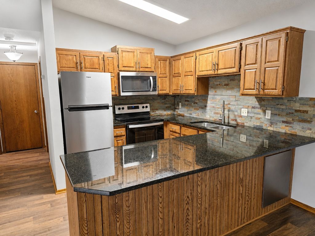 Photo of 11173 Edgewood Circle N, Champlin, MN 55316 (MLS # 7095160)