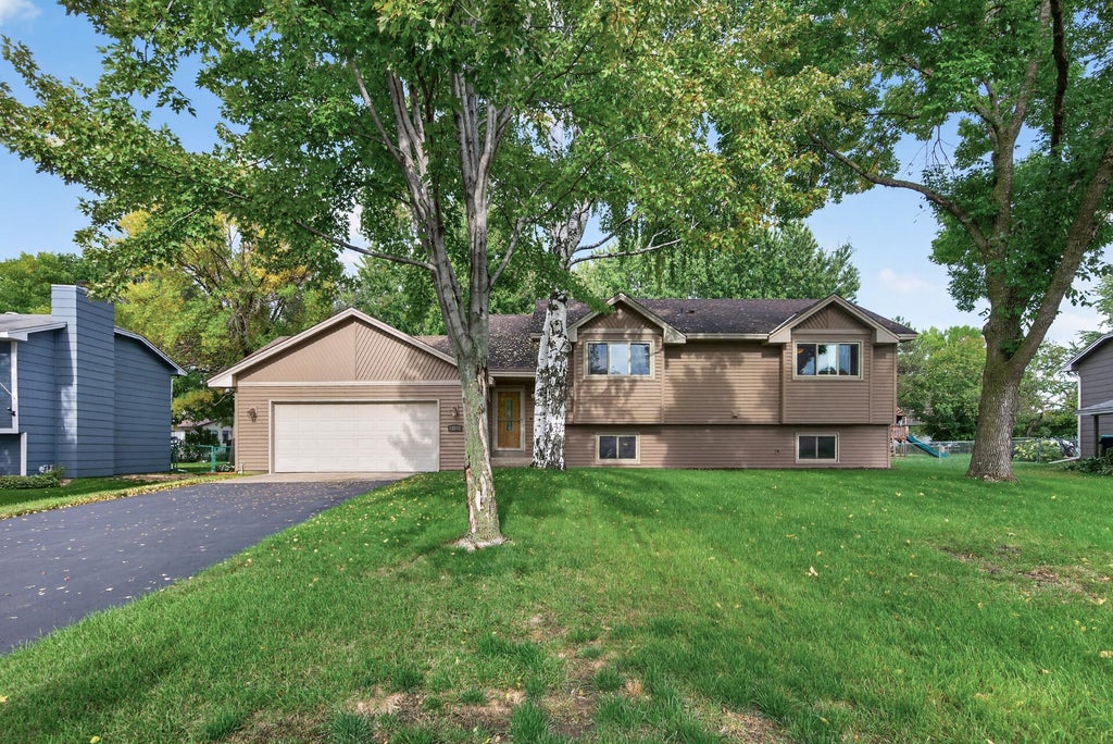 Photo of 11012 Xylon Lane N, Champlin, MN 55316 (MLS # 7149495)