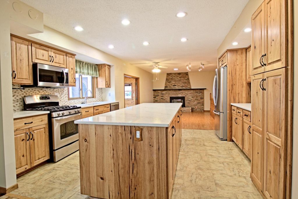 Photo of 7910 W Park Hills Drive, Bloomington, MN 55438 (MLS # 7055749)