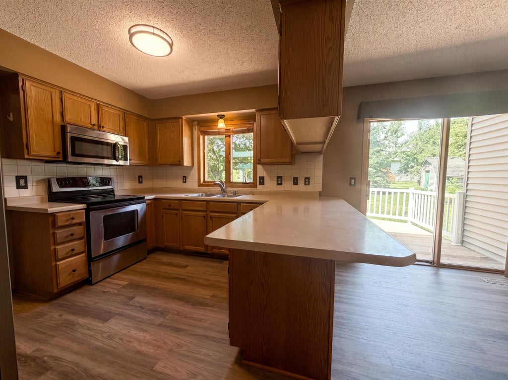 Photo of 9394 71st Bay S, Cottage Grove, MN 55016 (MLS # 7086453)
