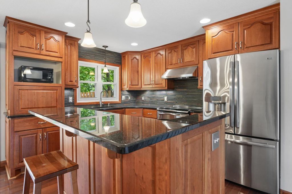 Photo of 543 Westby Drive NE, Spring Lake Park, MN 55432 (MLS # 7081229)