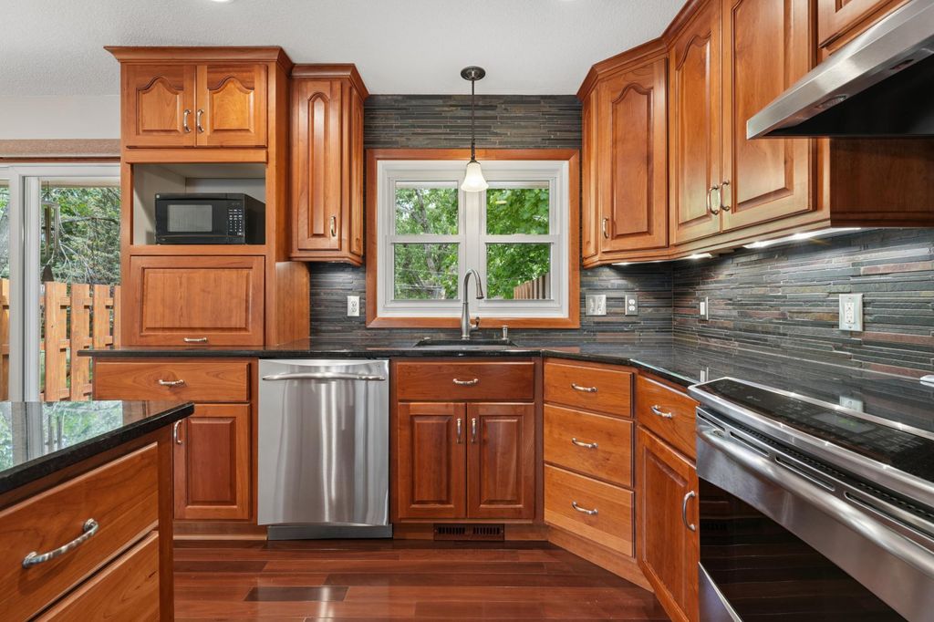 Photo of 543 Westby Drive NE, Spring Lake Park, MN 55432 (MLS # 7081229)