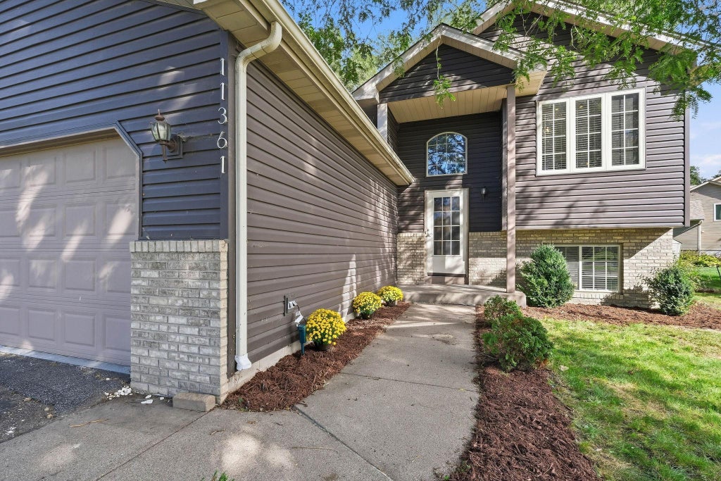 Photo of 11361 Tyler Street NE, Blaine, MN 55434 (MLS # 7154041)