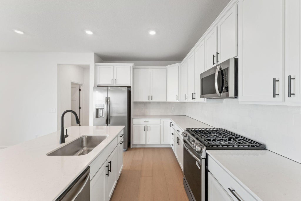 Photo of 8916 Periwinkle Boulevard, Woodbury, MN 55129 (MLS # 7106207)