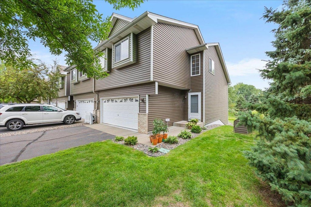Photo of 1180 122nd Lane NE, Blaine, MN 55434 (MLS # 7124477)