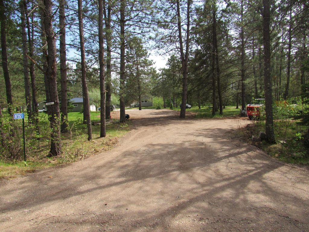 Photo of 87352 Kettle Shores Loop, Sturgeon Lake, MN 55783 (MLS # 7080201)