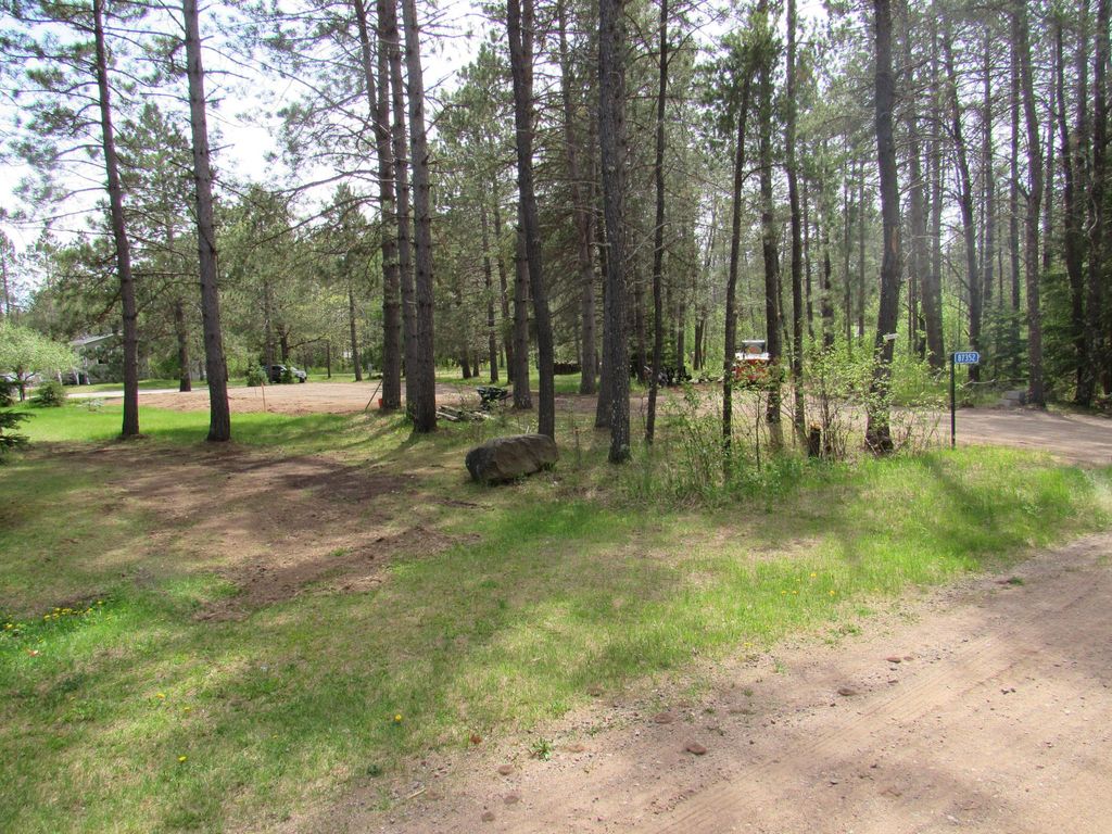 Photo of 87352 Kettle Shores Loop, Sturgeon Lake, MN 55783 (MLS # 7080201)