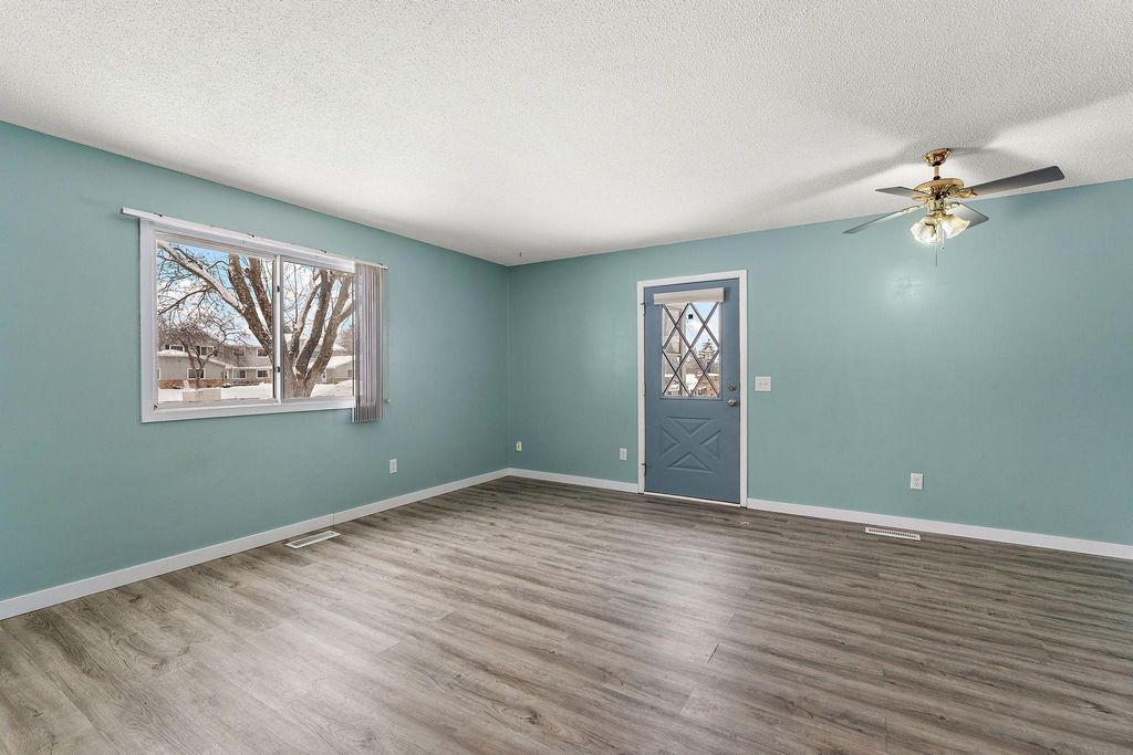 Photo of 11332 Ibis Street NW, Coon Rapids, MN 55433 (MLS # 6822971)