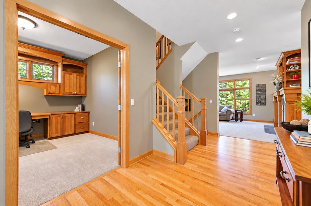 Photo of 11068 Sprucewood Lane N, Champlin, MN 55316 (MLS # 7145111)
