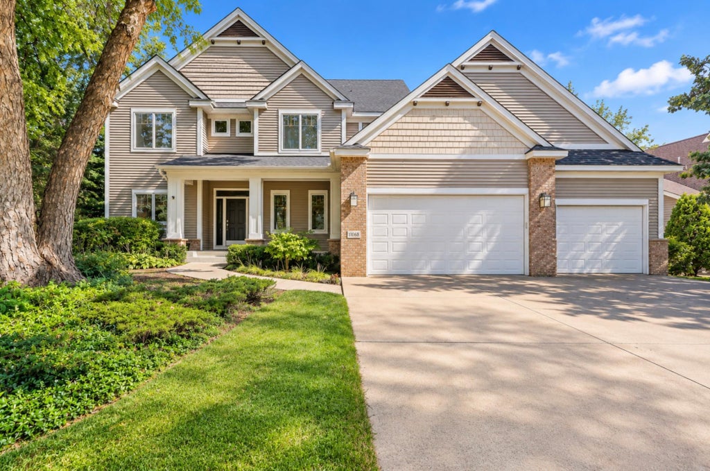 Photo of 11068 Sprucewood Lane N, Champlin, MN 55316 (MLS # 7145111)