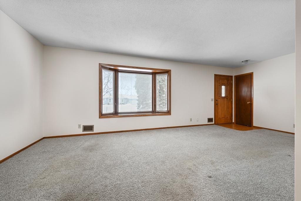 Photo of 10517 Quebec Avenue N, Brooklyn Park, MN 55445 (MLS # 7007227)