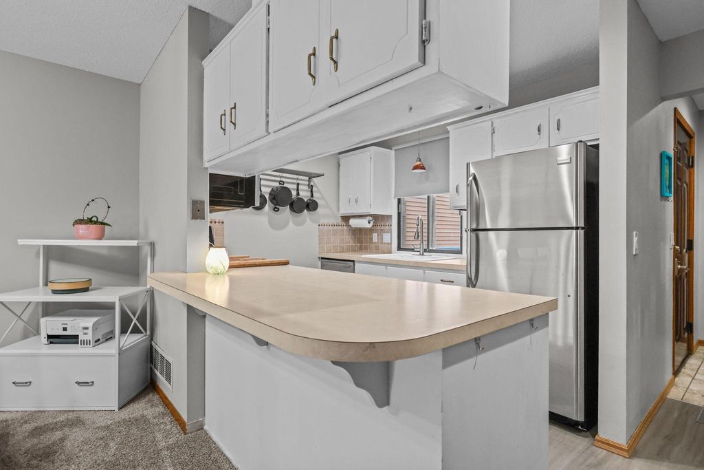 Photo of 104 South Drive #B, Circle Pines, MN 55014 (MLS # 6701469)