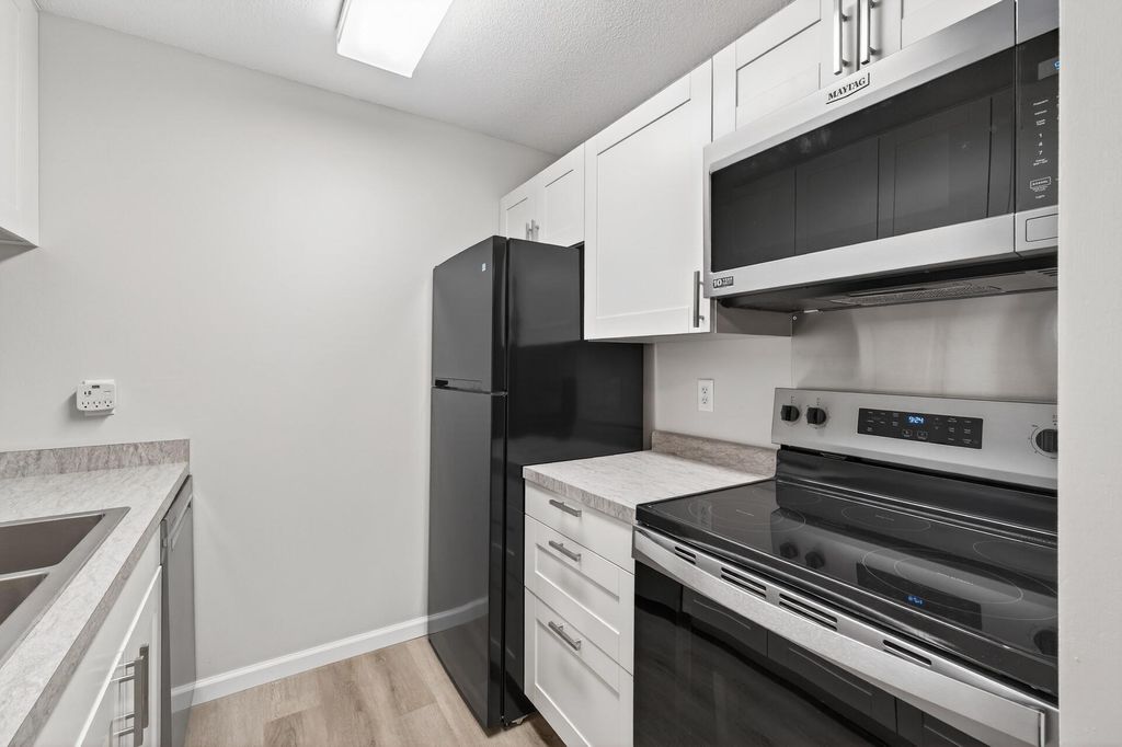 Photo of 2800 Hamline Avenue N #303, Roseville, MN 55113 (MLS # 7024664)