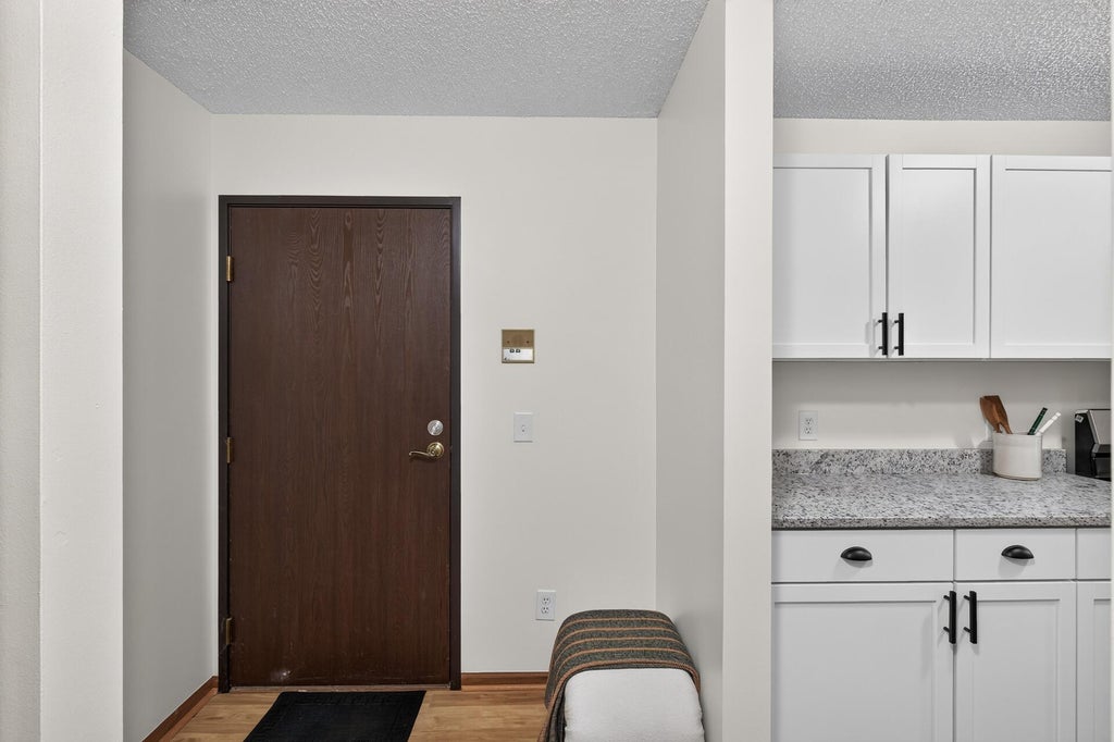 Photo of 1841 113th Avenue NW #105, Coon Rapids, MN 55433 (MLS # 7165500)