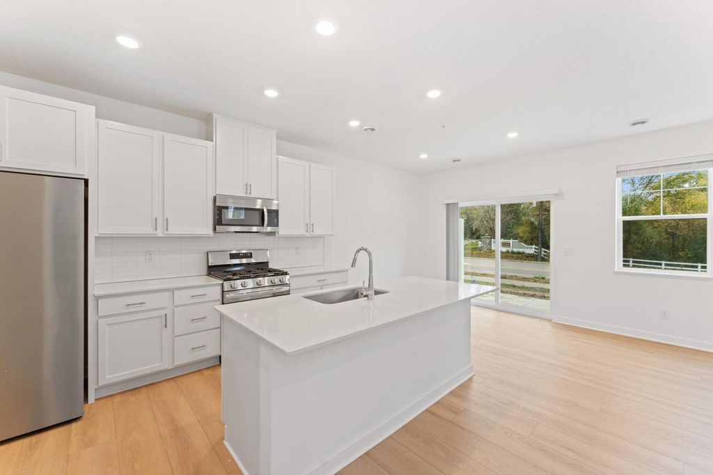 Photo of 10540 Harbor Lane N, Maple Grove, MN 55369 (MLS # 7043397)