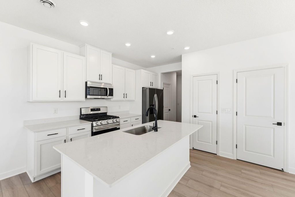 Photo of 10551 Harbor Lane N, Maple Grove, MN 55369 (MLS # 7072759)