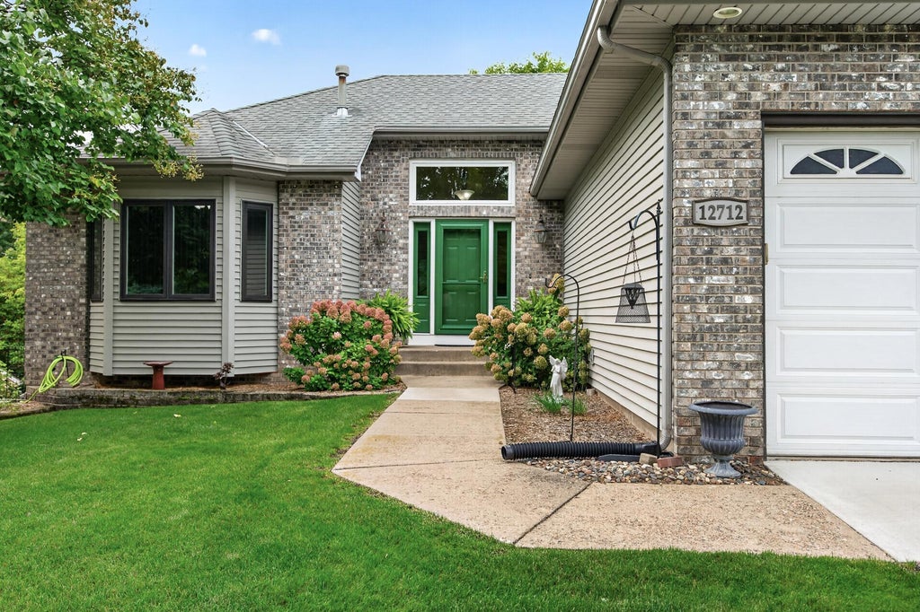 Photo of 12712 Crooked Lake Boulevard NW, Coon Rapids, MN 55448 (MLS # 7151686)