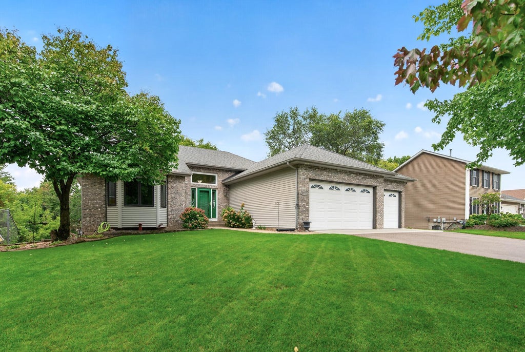 Photo of 12712 Crooked Lake Boulevard NW, Coon Rapids, MN 55448 (MLS # 7151686)
