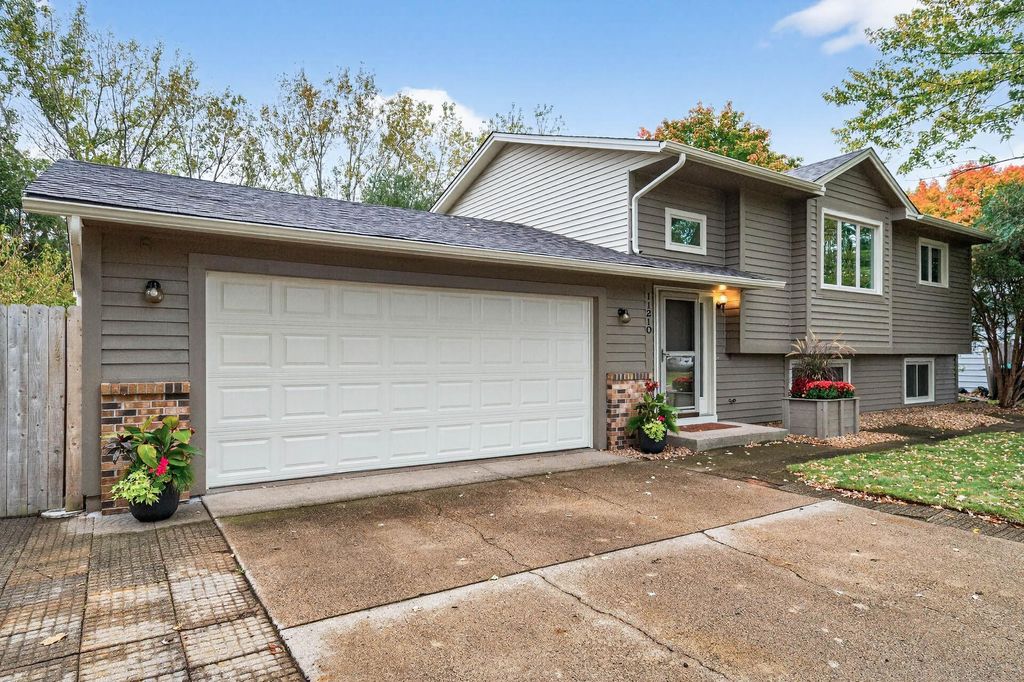 Photo of 11210 Utah Avenue N, Champlin, MN 55316 (MLS # 7026279)