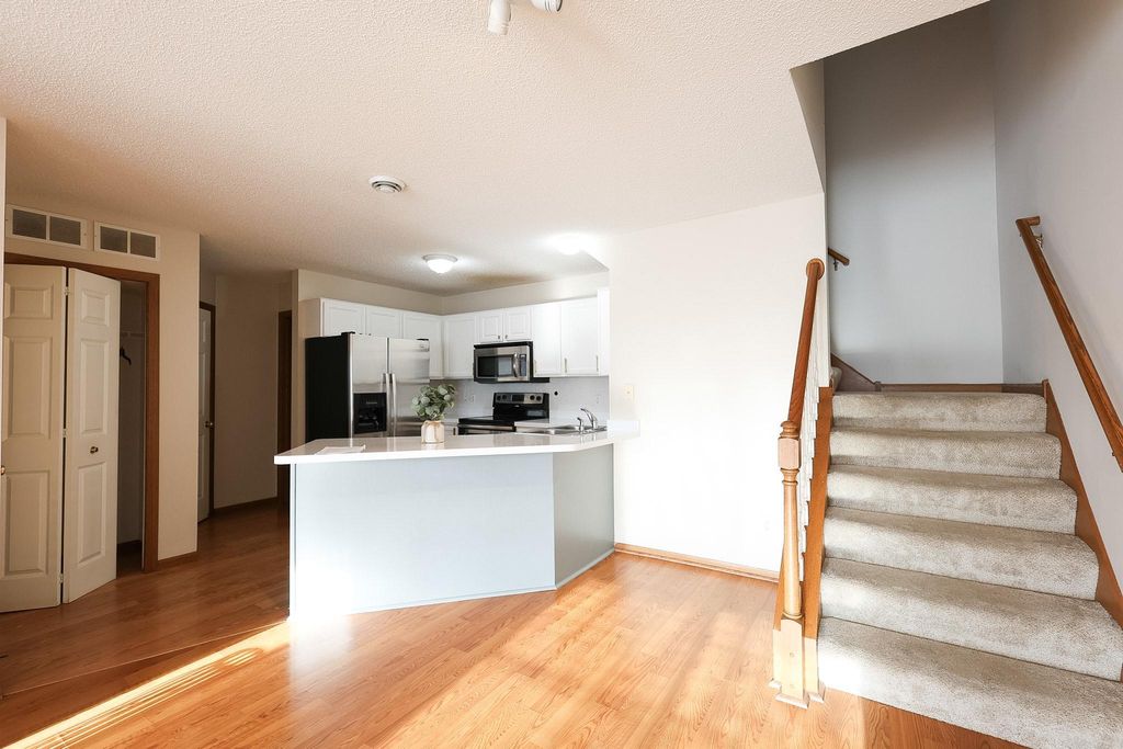 Photo of 1727 Riverwood Drive #62, Burnsville, MN 55337 (MLS # 7056260)