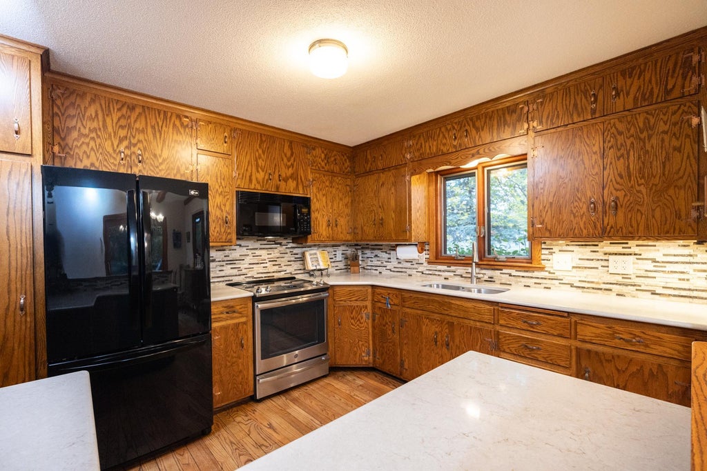 Photo of 2420 W 106th Street, Bloomington, MN 55431 (MLS # 7165804)
