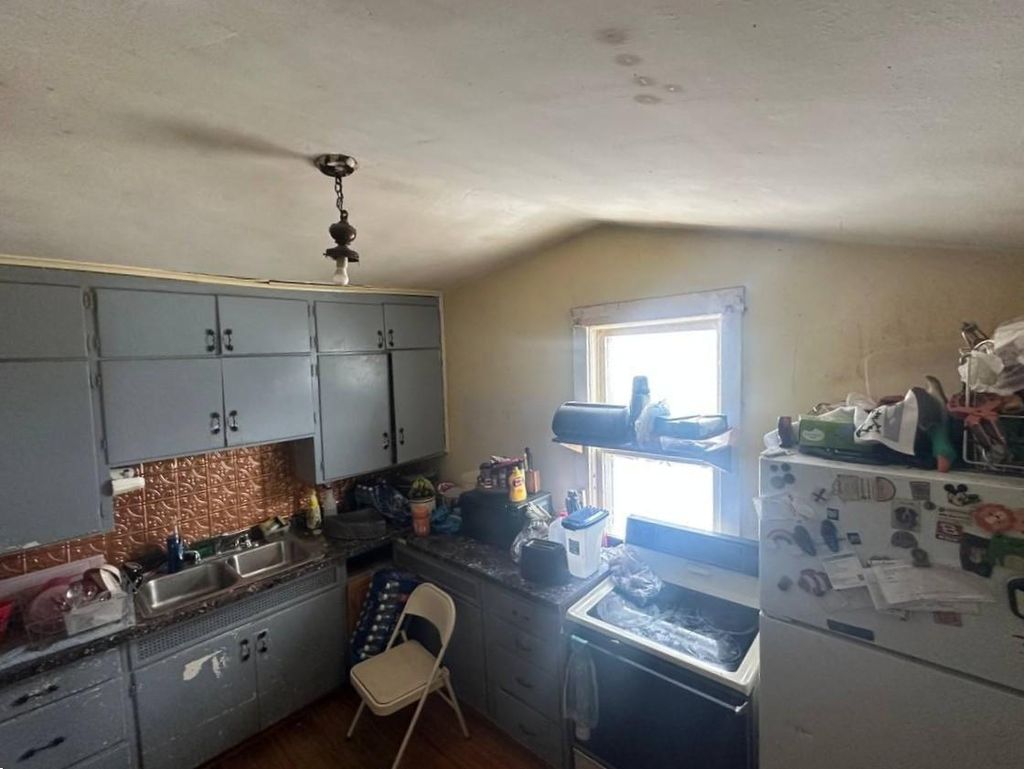 Photo of 415 3rd Street SW, Chisholm, MN 55719 (MLS # 7022137)