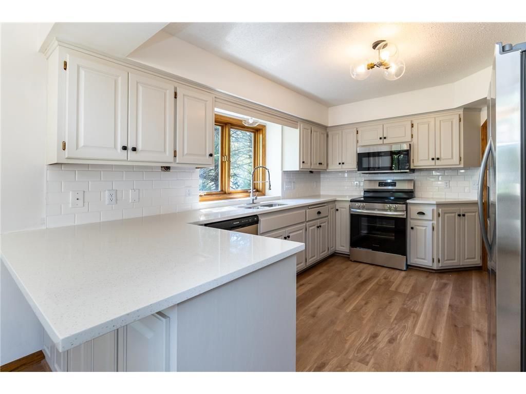 Photo of 5619 Dunlap Avenue N, Shoreview, MN 55126 (MLS # 7058123)