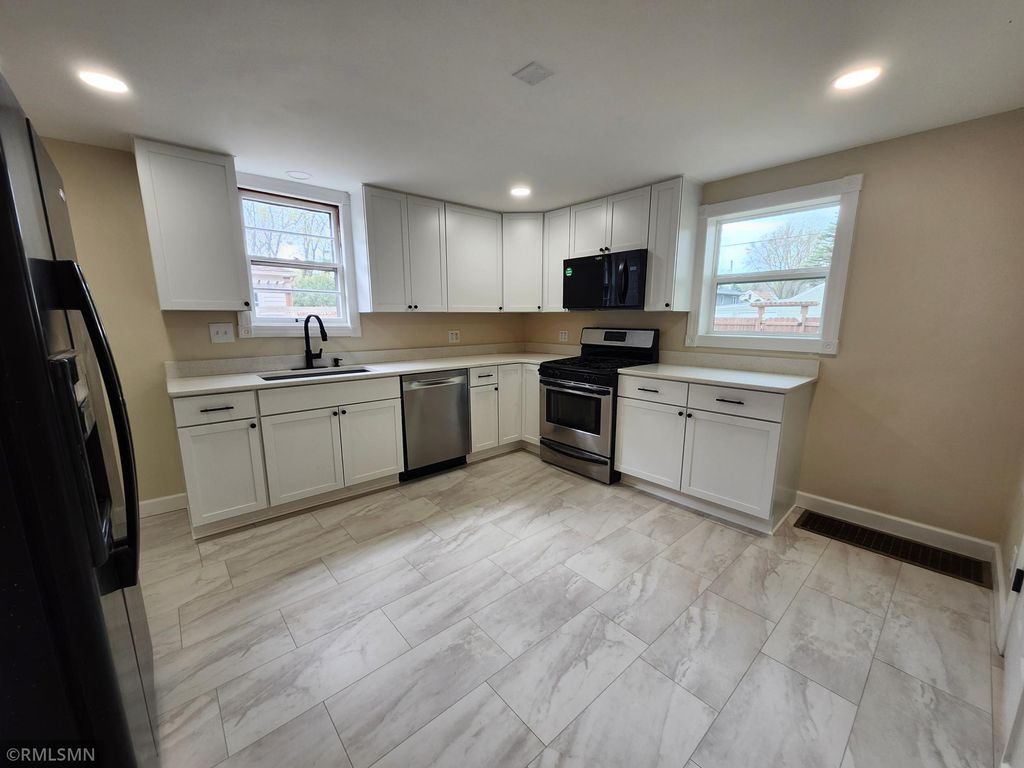 Photo of 919 Warner Avenue, South Saint Paul, MN 55075 (MLS # 7050502)