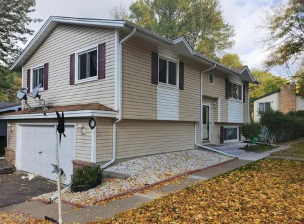 Photo of 10460 Tamarack ST, Coon Rapids, MN 55433 (MLS # 7054472)