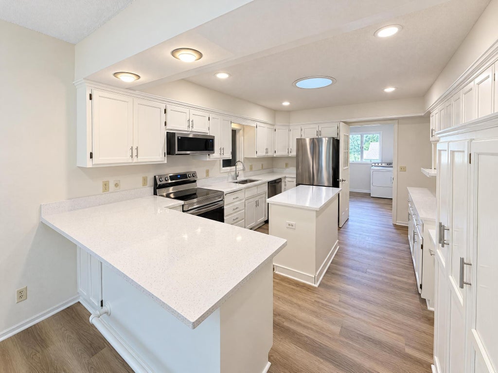Photo of 3235 Park Overlook Drive, Shoreview, MN 55126 (MLS # 7167421)