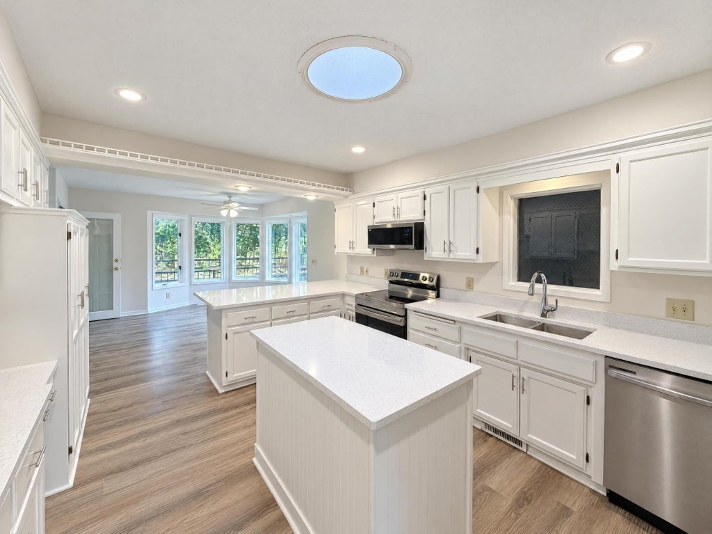 Photo of 3235 Park Overlook Drive, Shoreview, MN 55126 (MLS # 7167421)