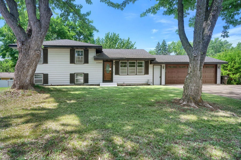 Photo of 11340 Gladiola Street NW, Coon Rapids, MN 55433 (MLS # 7089458)