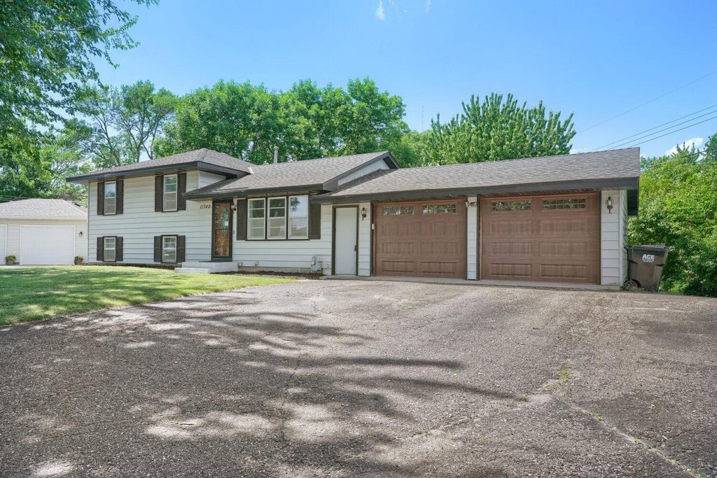 Photo of 11340 Gladiola Street NW, Coon Rapids, MN 55433 (MLS # 7089458)