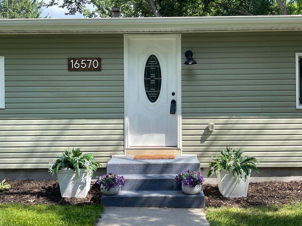 Photo of 16570 22nd Street S, Saint Marys Point, MN 55043 (MLS # 7123632)