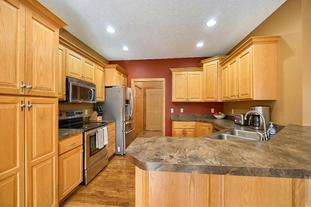 Photo of 10106 Chestnut Circle N, Brooklyn Park, MN 55443 (MLS # 7039239)