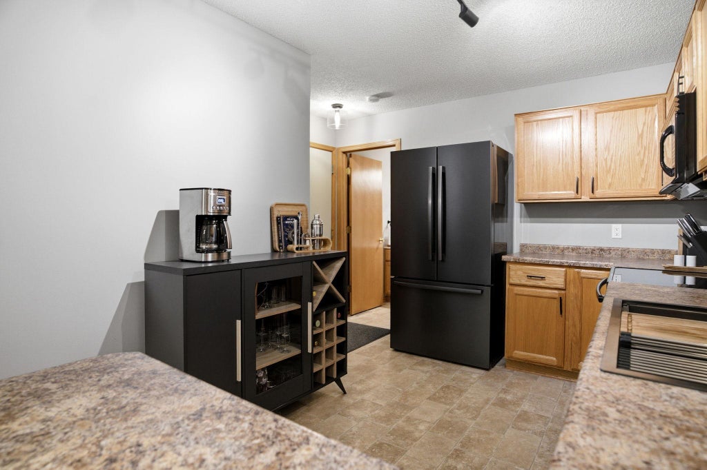 Photo of 8854 Spring Lane, Woodbury, MN 55125 (MLS # 7095324)