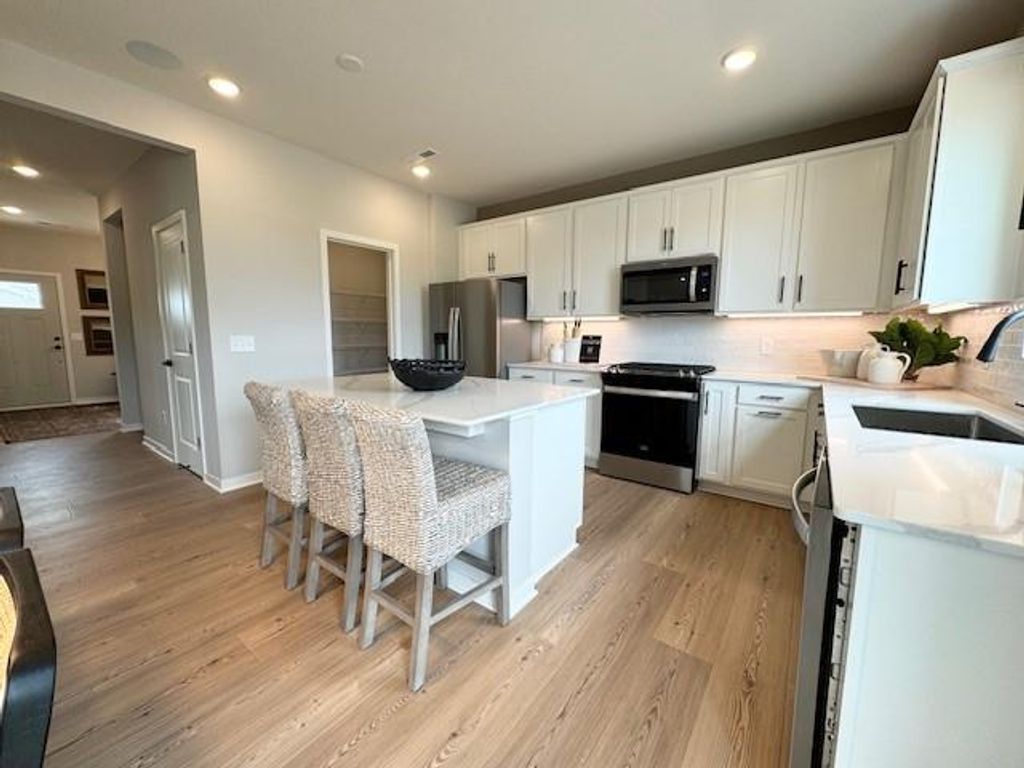 Photo of 4947 Airlake Drive, Woodbury, MN 55129 (MLS # 7009612)