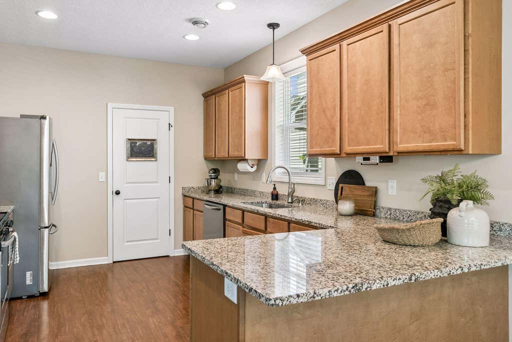 Photo of 12405 Bataan Street NE, Blaine, MN 55449 (MLS # 7098166)