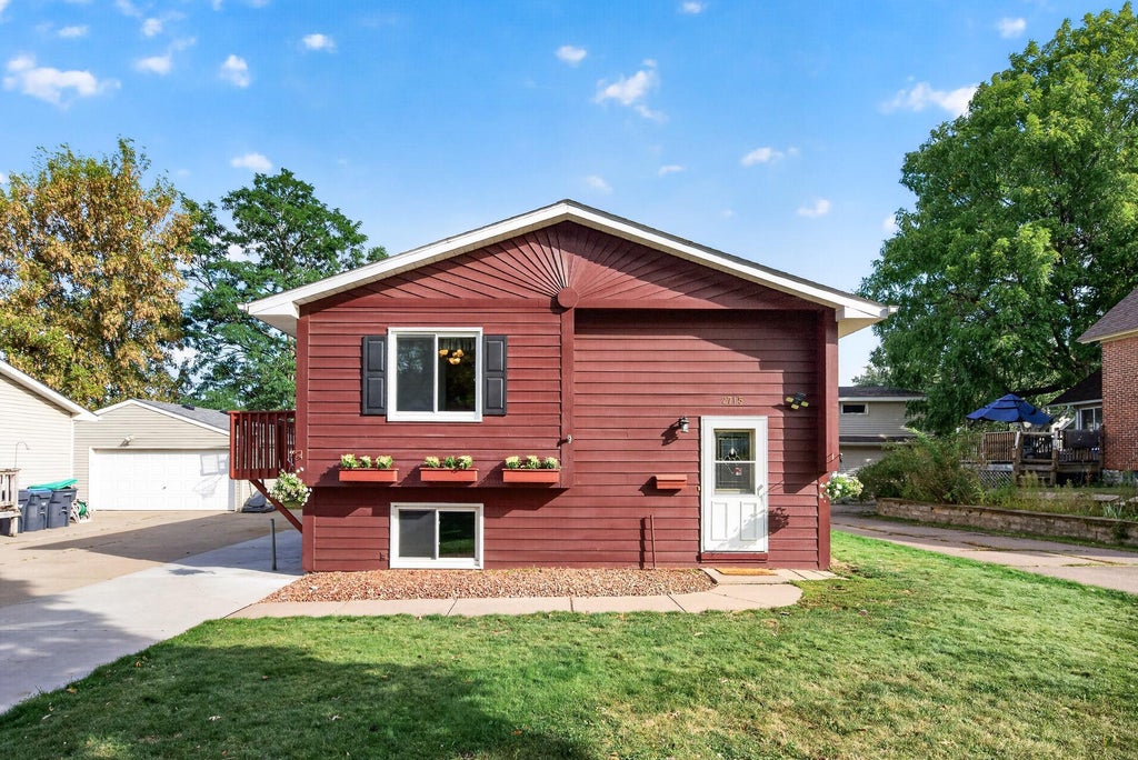 Photo of 2715 10th Avenue E, North Saint Paul, MN 55109 (MLS # 7132419)