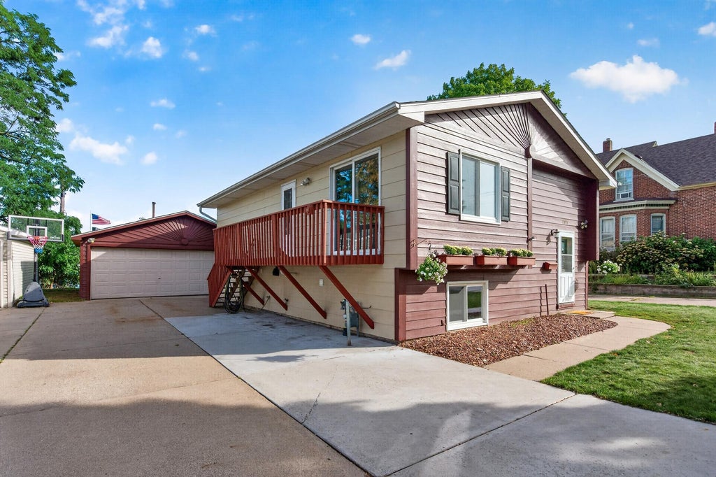 Photo of 2715 10th Avenue E, North Saint Paul, MN 55109 (MLS # 7132419)