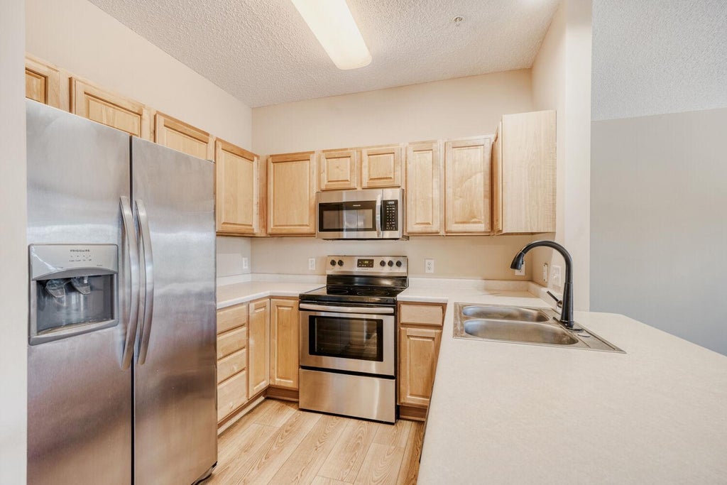 Photo of 6554 Merrimac Lane N, Maple Grove, MN 55311 (MLS # 7092692)