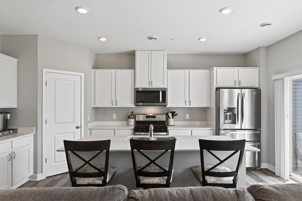 Photo of 12536 Guadalcanal Circle NE #E, Blaine, MN 55449 (MLS # 7144379)
