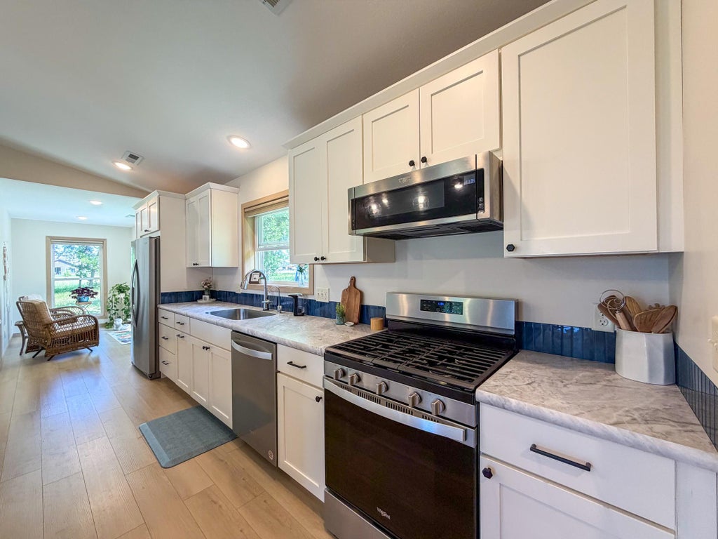 Photo of 612 Irving Beach Drive SW, Bemidji, MN 56601 (MLS # 7095532)